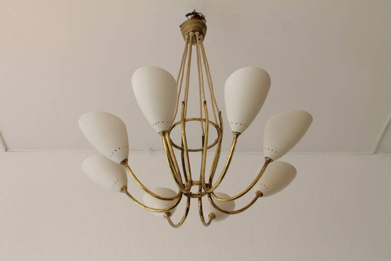 Elegant eight brass arms chandelier, Switzerland 1950s
Two pieces available