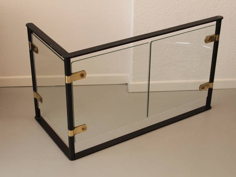 Cast iron, brass and glass corner freestanding fire screen.
Tempered glass doors, brass hinges and black iron frame.