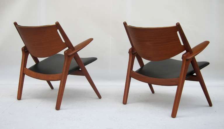 Mid-20th Century Matching Pair of Hans J. Wegner CH-28 Sawbuck Armchairs 1950's For Sale