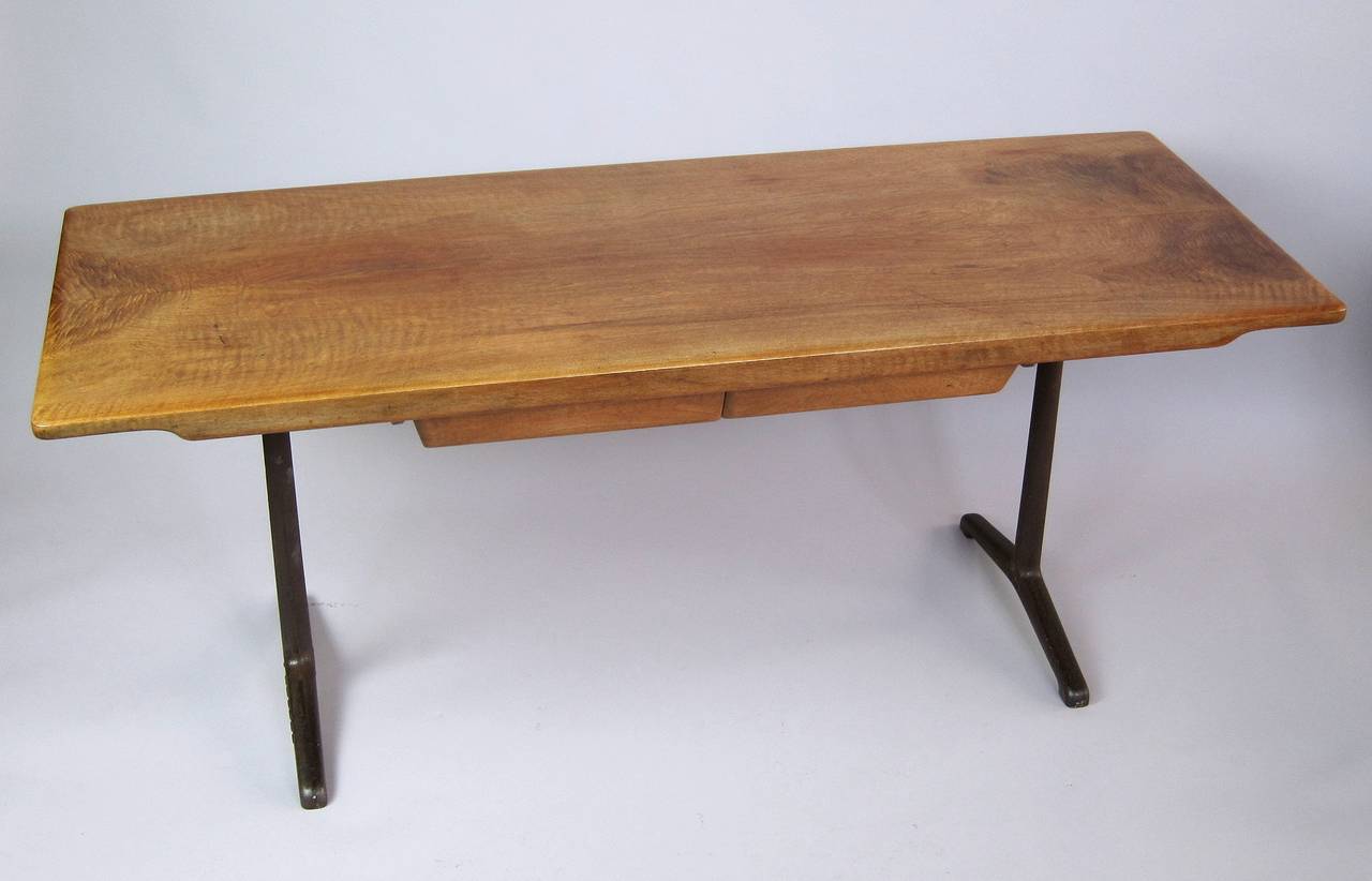 Charming and light Walnut Dining Table with 2 Drawers, carefully handcrafted,
with Cast Iron Feet by HorgenGlarus Switzerland 1950's
