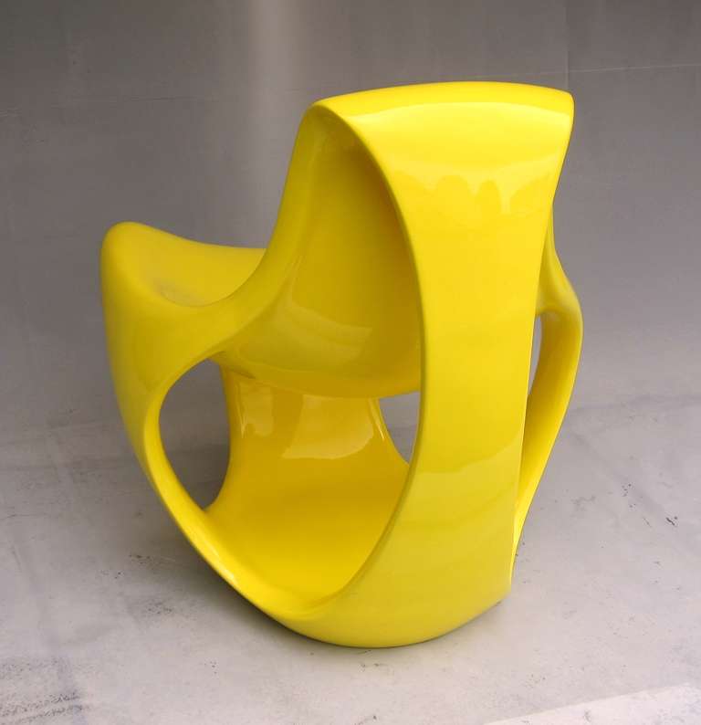 Organic molded fiberglass chair in the Style of Danielle Quarante. 
Spectacular views from all sides, restored, new yellow lacquer.