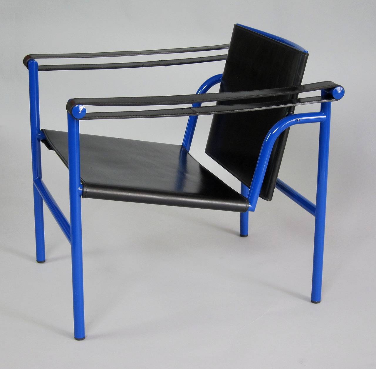 Probably unique in this color, this pair of Le Corbusier armchairs 