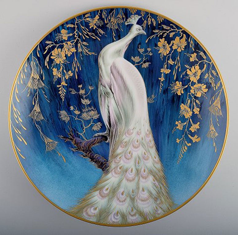 Heinrich:: großer Teller:: handbemalt im japanischen Stil mit einem Pfau. 
Perfekter Zustand. Maße: 34::5 cm.