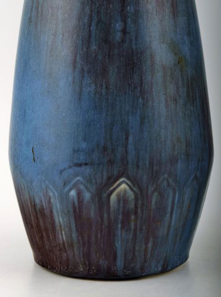 Gunnar Nylund, Rörstrand vase in ceramics.
Beautiful glaze.
In perfect condition. 2. factory quality.
29 cm. heights. Hallmarked.