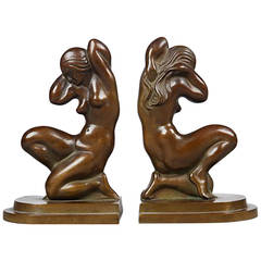Two Tinos Bookends in Patinated Bronze Cast in the Form of Kneeling Women