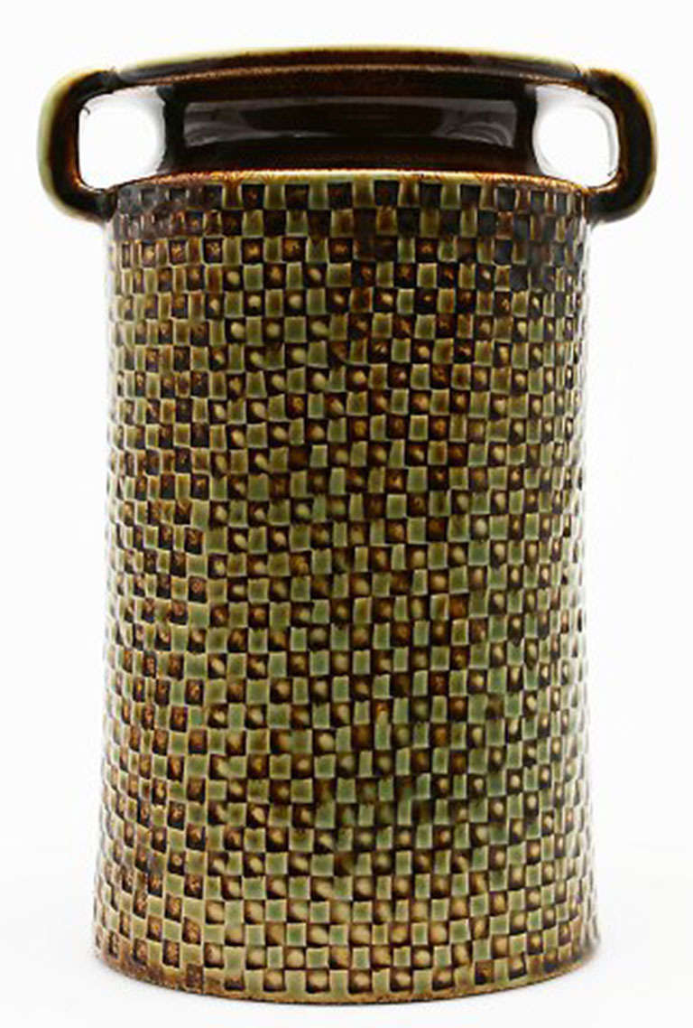 Vase, stoneware, Stig Lindberg, Gustavsberg Studio. Brown Green glaze. Board pattern in relief, with handles. Stamped Stig L and Gustavsberg Studio hand.
Height 22.5 cm.
In perfect condition.