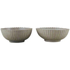 Arne Bang, two stoneware bowls, exteriors modelled with rifled patterns.
