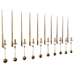 Pierre Forsell Set of Ten "Pendulum" Wall Mounted Brass Candlesticks