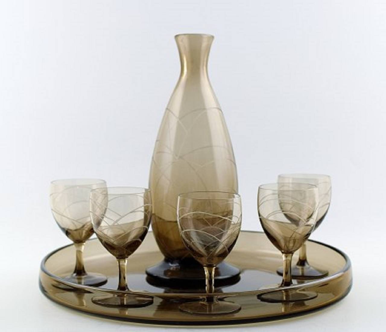 Daum Nancy Art Deco bar set, decanter and five glasses on tray.
The decanter measures 25cm.
Hallmarked.
In perfect condition.