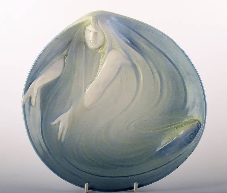 Rare Royal Copenhagen Art Nouveau dish decorated with mermaid and fish. In perfect condition, factory first. 21.5 cm. in diameter.