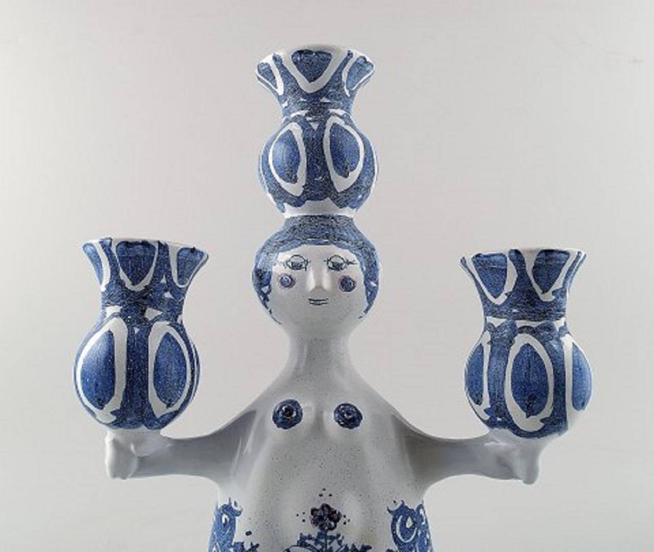 Bjorn Wiinblad, lady, unique three-armed candelabra.
In perfect condition. Dated 73.
Size: 32 cm. height.