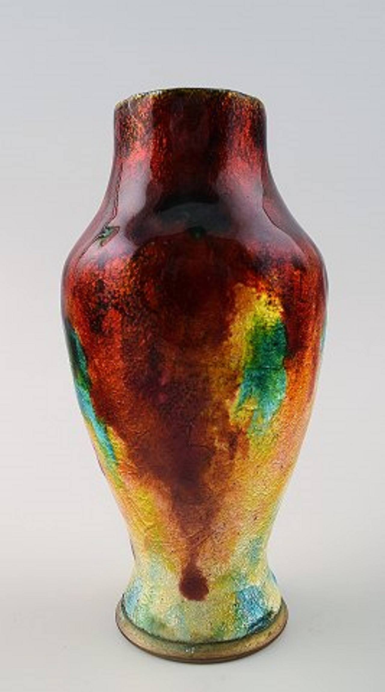 Art Nouveau Limoges vase by Faure´ Marty, France.
Enamel bronze vase, glaze in many colors.
Signed.
An excellent Art Nouveau vase of great quality, circa 1910s.
In perfect condition.
Size: 14 x 7.5cm.