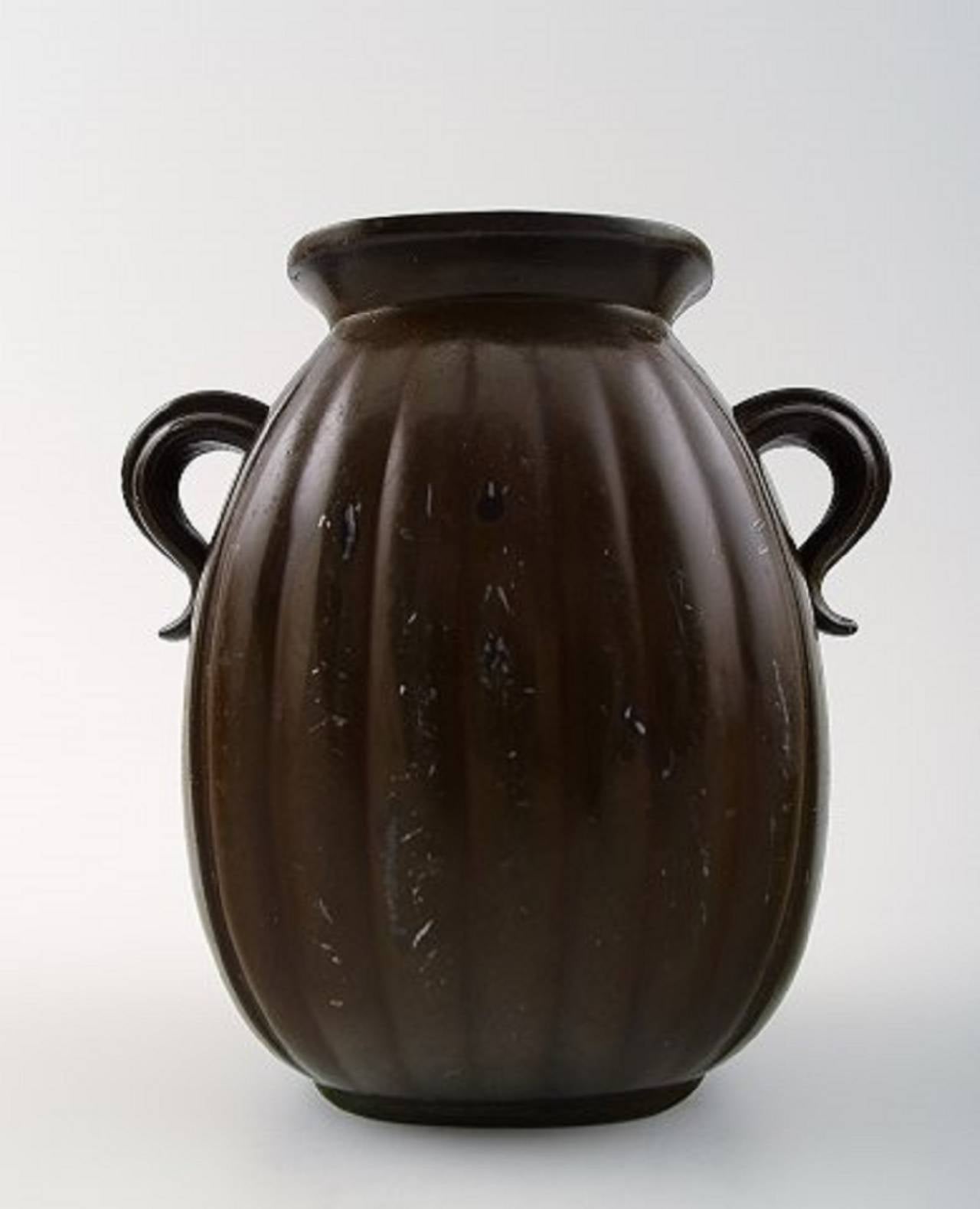 Just Andersen Art Deco metal vase, number D133.
1930s.
Marked. Good condition, some wear.
Measures: 9.5 x 9 cm.