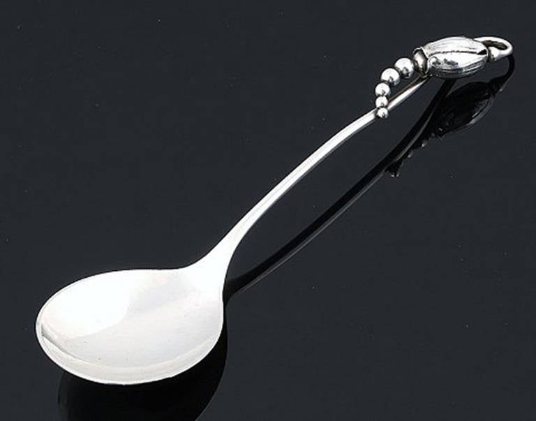Georg Jensen, 'Magnolia' jam spoon, sterling silver. 
In perfect condition.