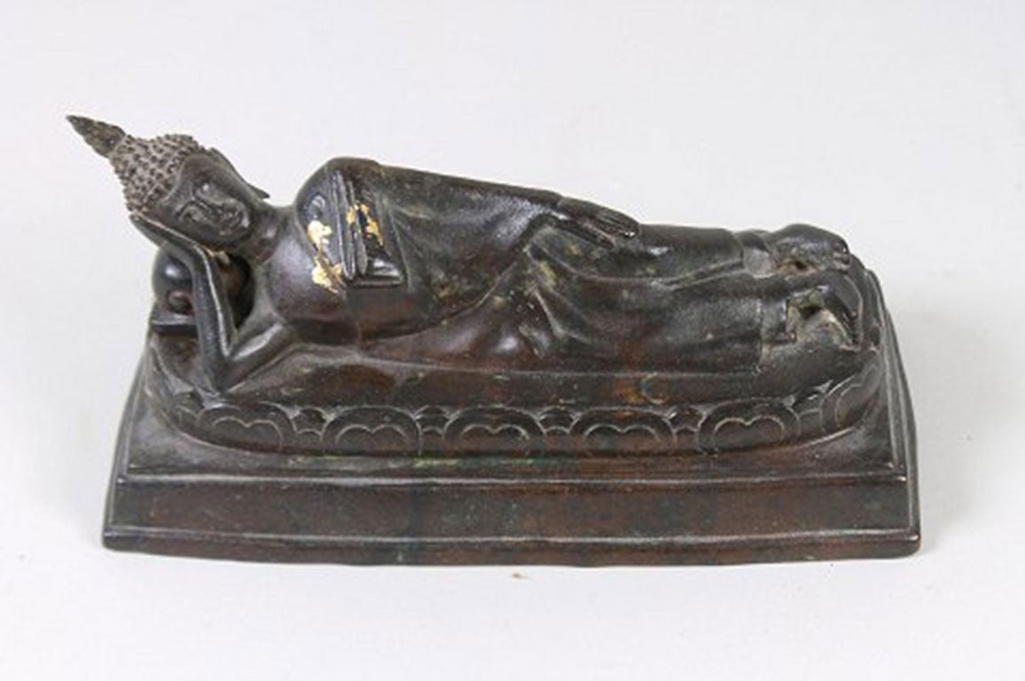 Reclining Buddha, bronze.
