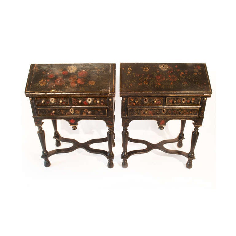Late 17th century style. Each decorated overall with flower sprays, with fold-over top lined with yellow baize enclosing a fitted interior, above two small and one long drawer, with octagonal-shaped tapering legs, joined by an X stretcher, on bun