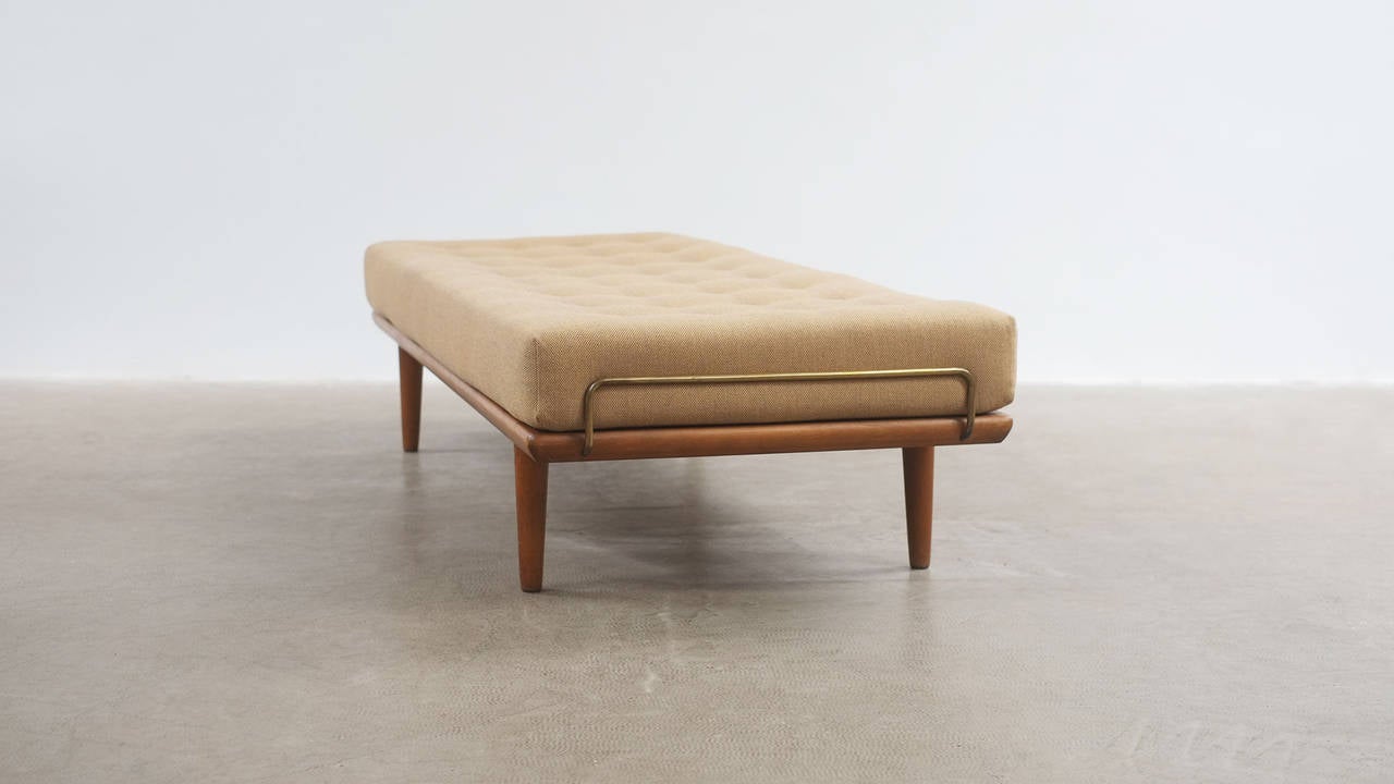 Superb daybed designed by Hans Wegner for Getama, Denmark. This example with beautiful new upholstery on original fully sprung mattress.
