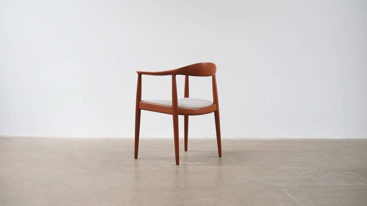 Rare Round Chair in teak designed by Hans Wegner for cabinet maker Johannes Hansen, Denmark. Fabulous quality, details and ultra elegant design. This example with grey Kvadrat Hallingdal fabric seat. The most famous of all Wegner pieces.