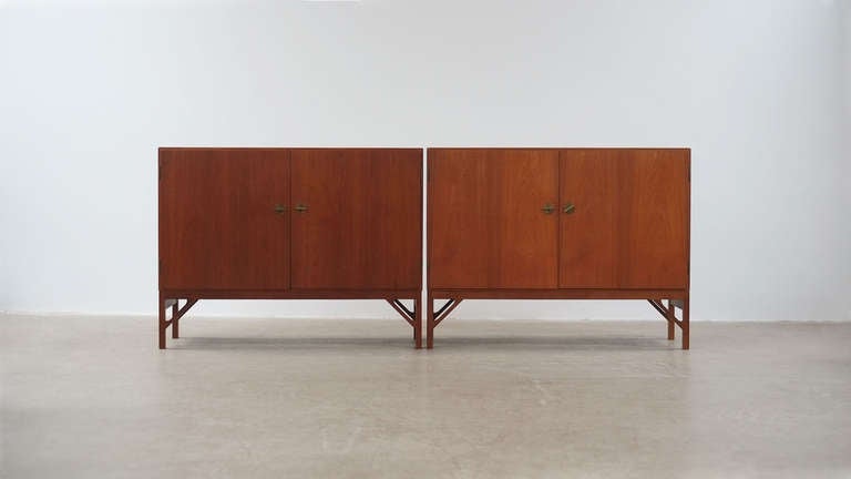 Wonderful cabinets in teak with contrasting interior in birch designed by Borge Mogensen for FDB, Denmark. Super high quality and ultra elegant with fantastic leg details and brass feature keys.