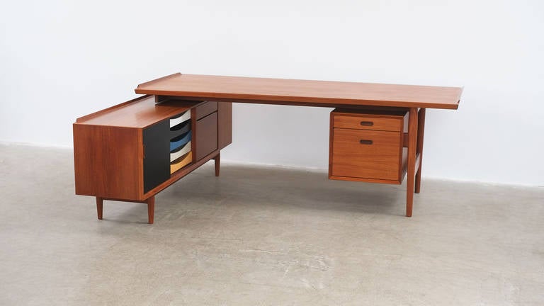 Fantastic desk and return in teak with original coloured drawers designed by Arne Vodder for Sibast, Denmark. Super fine quality and very striking piece.