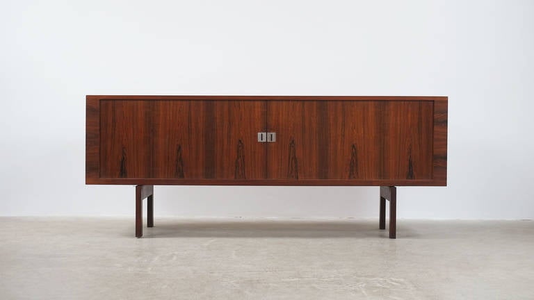 Amazing and very rare President sideboard in rosewood with contrasting oak interior designed by Hans Wegner for RY Mobler, Denmark. Super sought after piece of Wegner design with beautiful proportions and excellent details. This example with