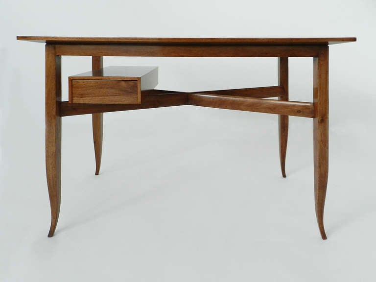Small but impeccably made desk. Very elegant and functional with its suspended drawer.