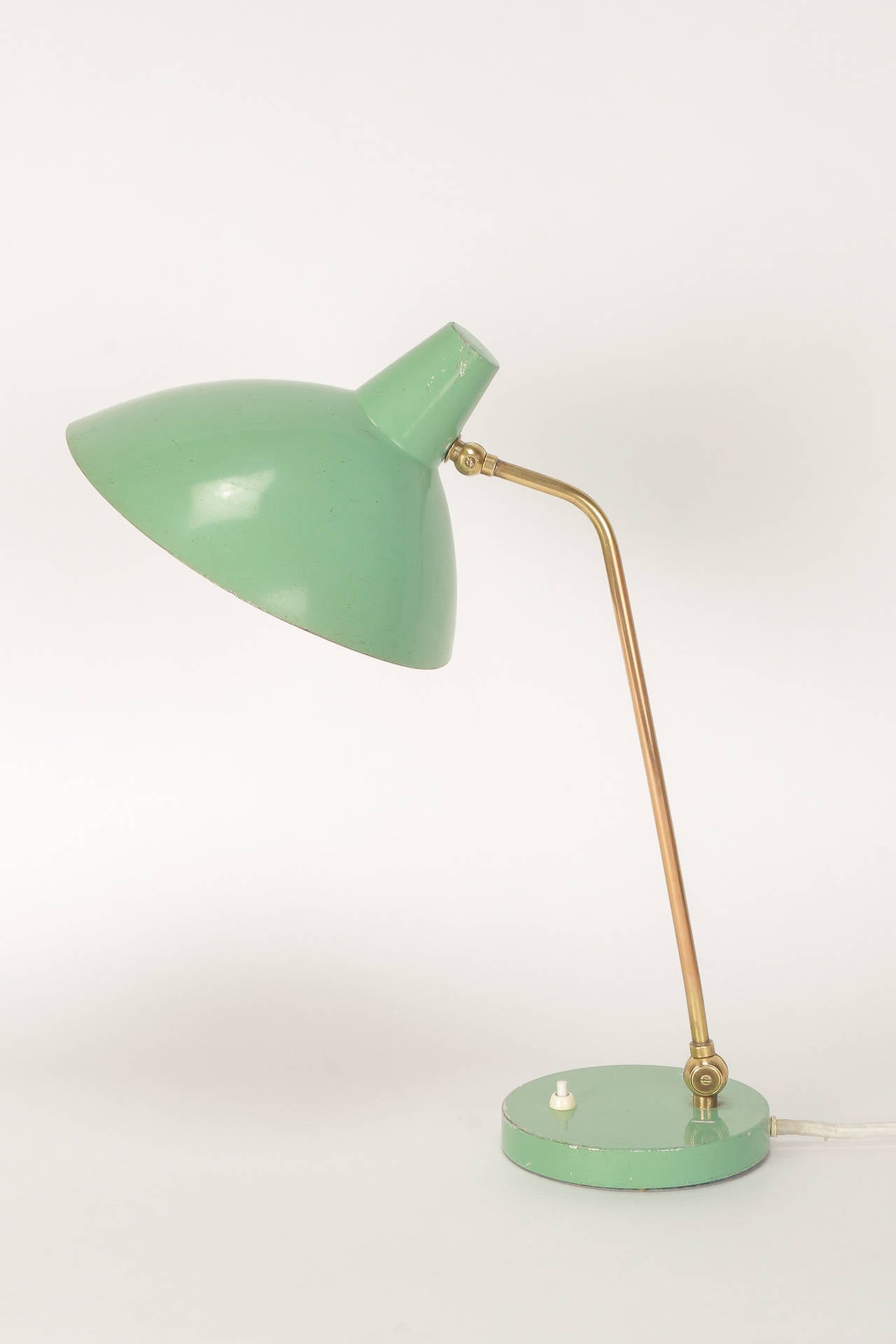Rare Swiss desk lamp by Alfred Mueller for Amba, Switzerland, 1950s. Very unique (original) color in mint green. Shade and rod stem can be adjusted.