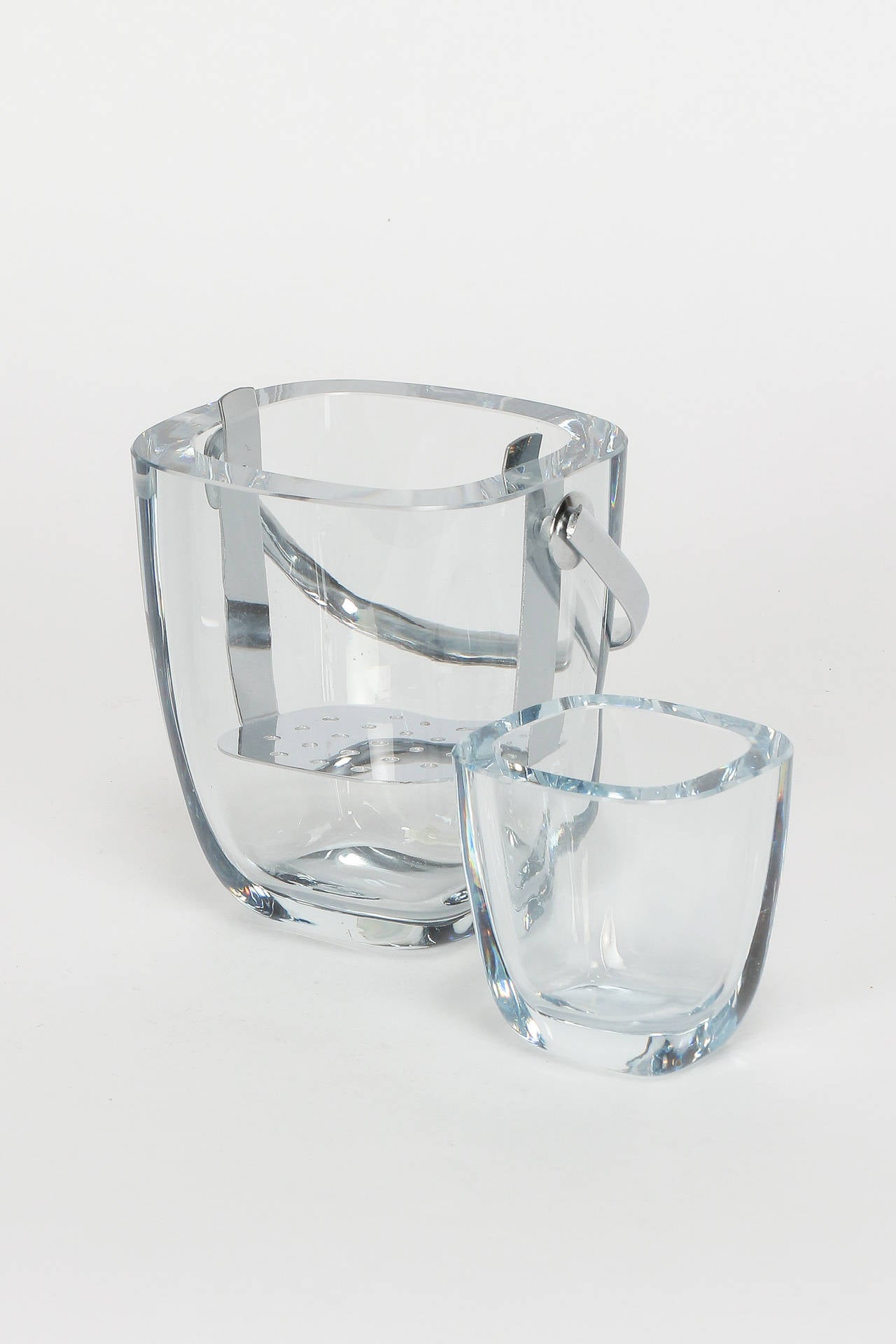 Swedish ice bucket to cool caviar by Asta Strömberg for Stömbergshyttan at the end of the 1950s. Both glasses are signed on bottom. Original Strömbergshyttan sticker to bucket