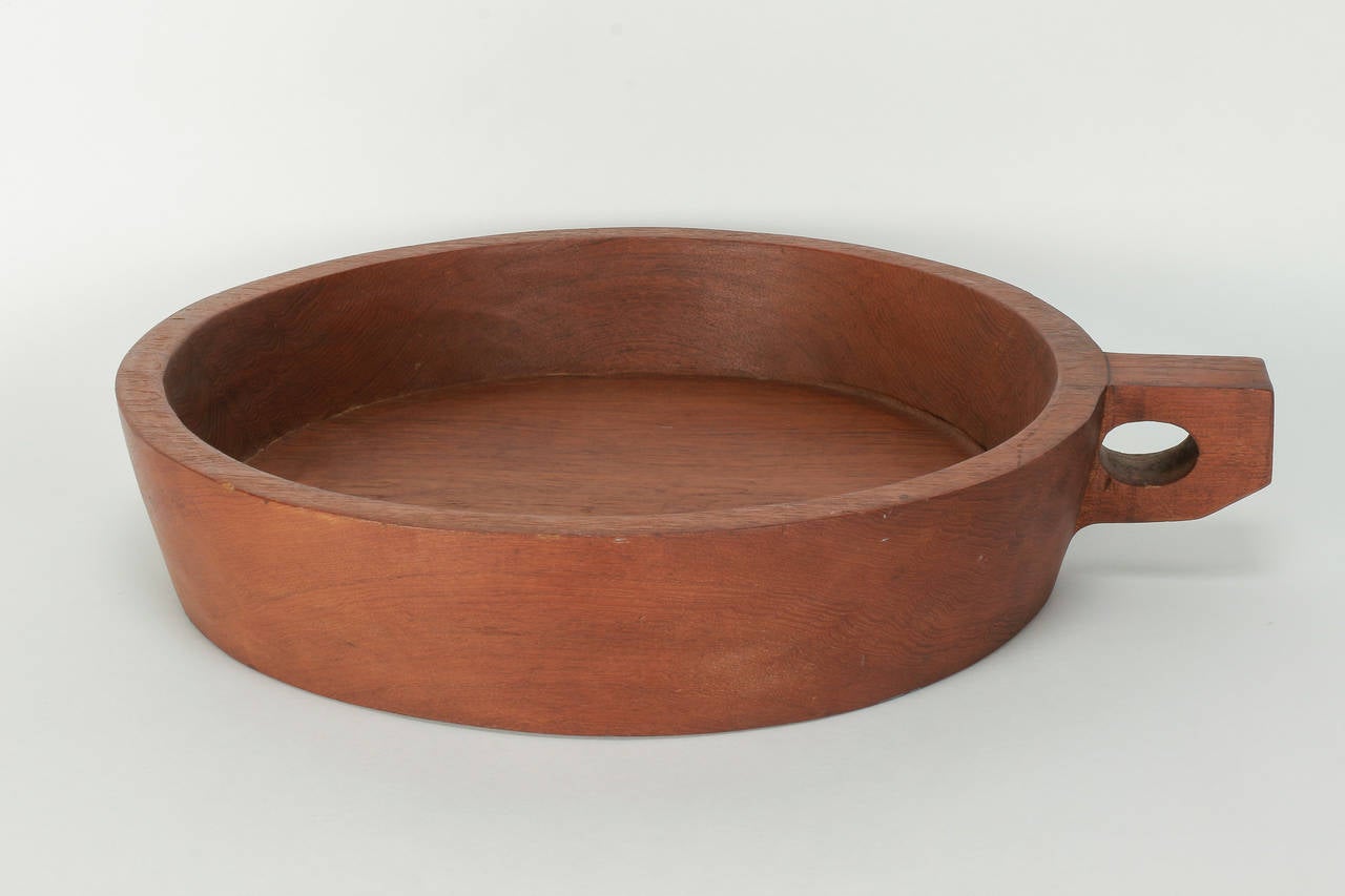 Huge teak bowl, hand-carved in Denmark in the 1960's
Diameter: 50cm (without handle)