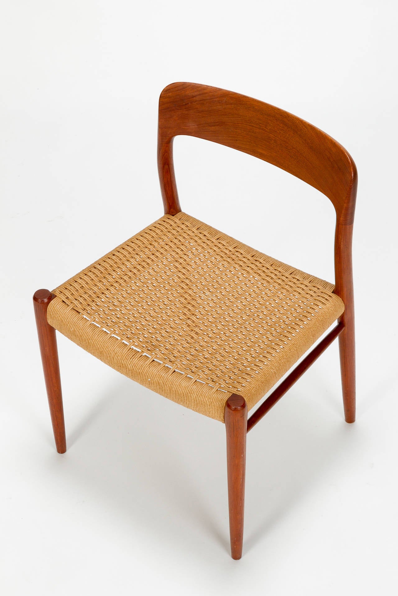 Eight Danish Dining Chairs Model 75 by Niels Moller in Teak and Papercord In Excellent Condition In Basel, CH