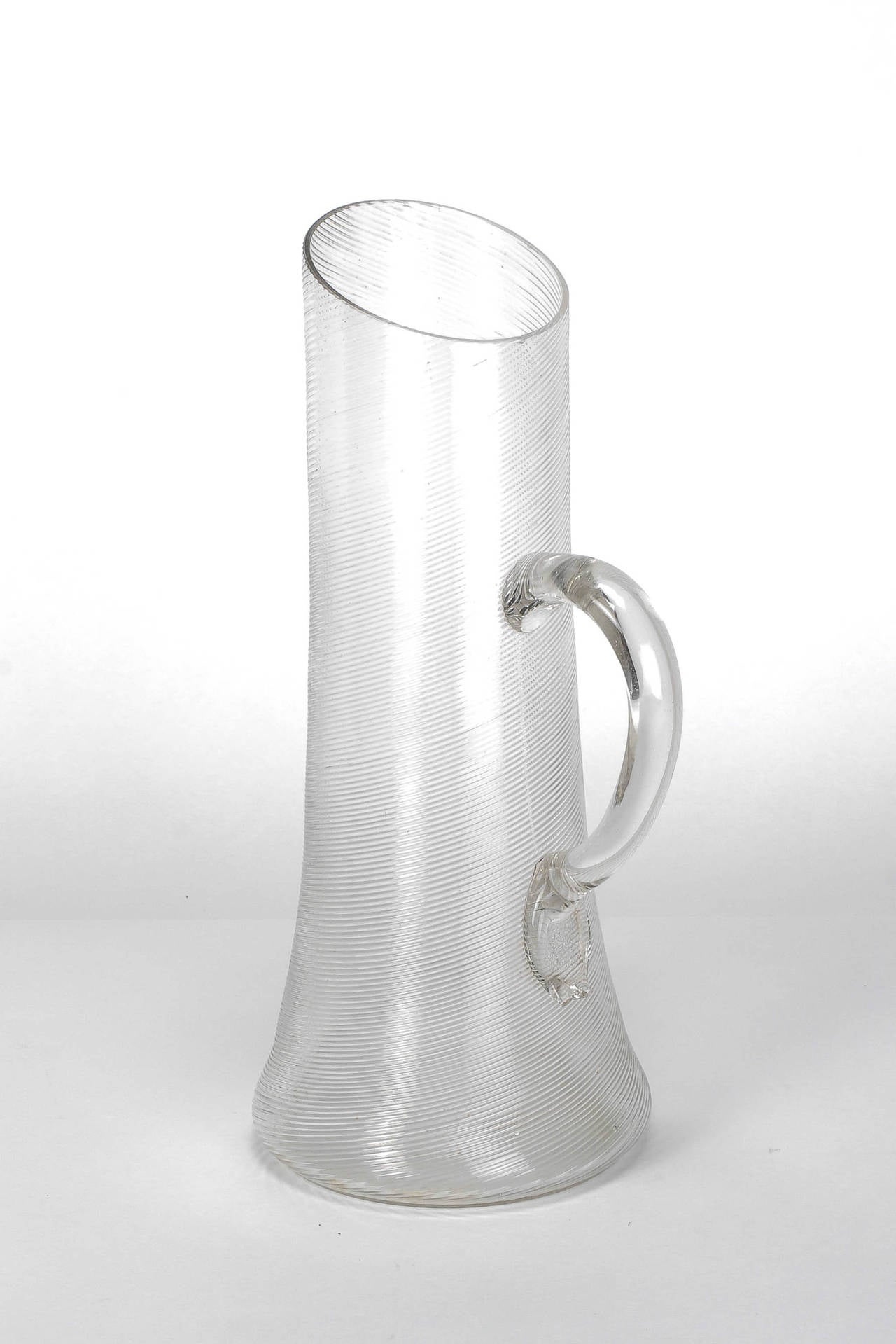 Stunning mouth-blown filigrana glass jar by Venini in the 1930s, Italy. Very fine ribbed glass, beautiful shape with a organically shaped handle