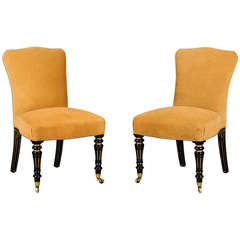 Pair of Black and Gilt Chairs