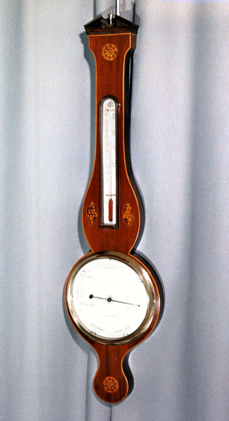 A very good George III period mahogany and shell inlaid eight inch dial wheel barometer signed Bernascheni & Monli, Leicester with silvered dial and thermometer scale. 

Literature:
These makers are listed in “English Barometers, 1680 to 1860” by