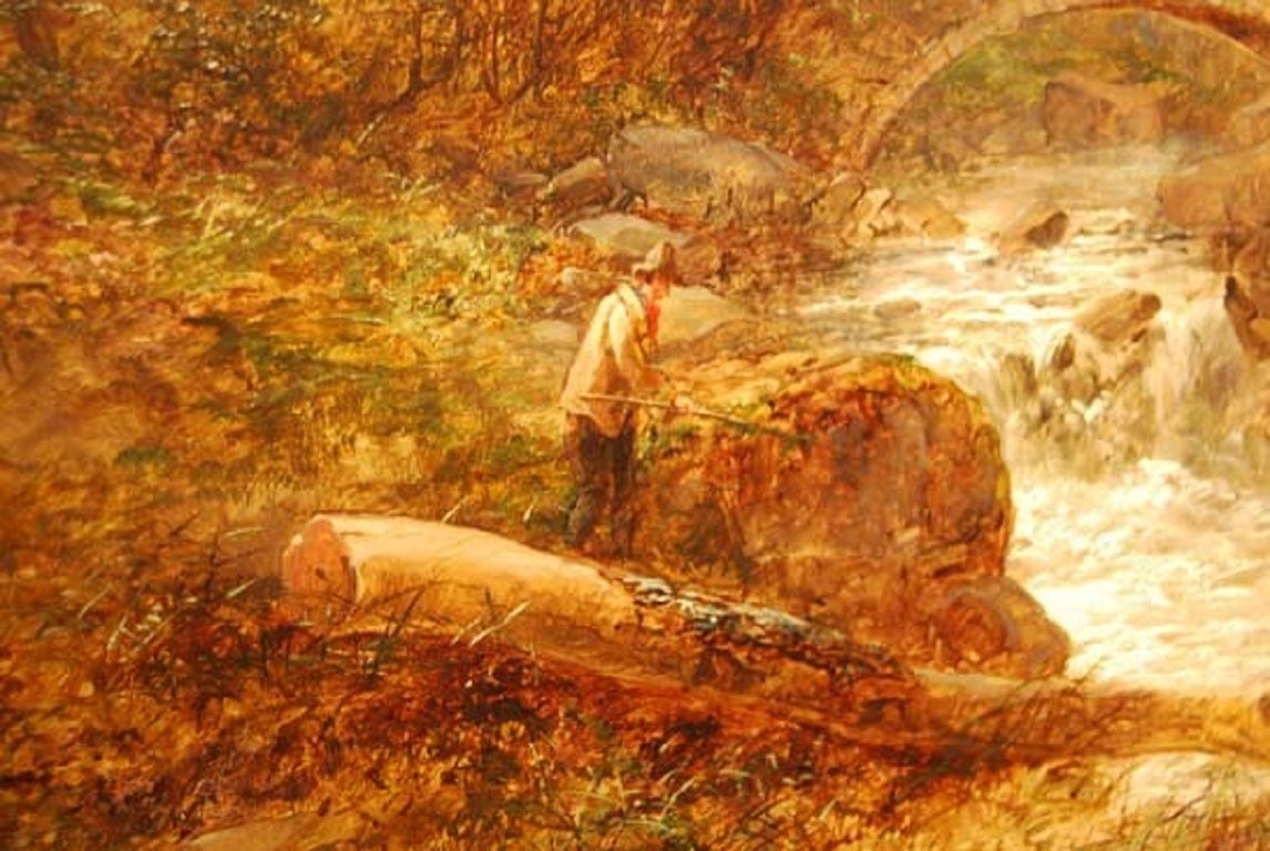 “Angler on the Bank of a Mountain River, with a Bridge and Mountains beyond.” 
Mid-19th century oil on canvas by John Brandon Smith signed in the bottom right hand corner. This is typical of his work and appears to be in Wales which would date this