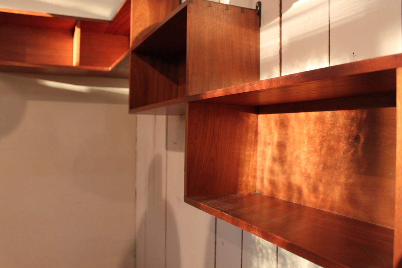 A very interesting oak Corner geometrical Shelve from the 60's in the manner of pierre Guariche.