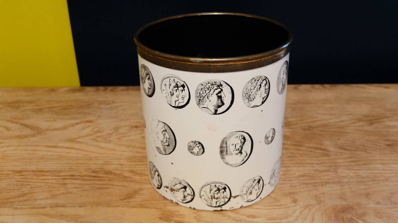 A ice and typical 1960 signed piero Fornasetti basket,Painted sheet steel representing  antique faces