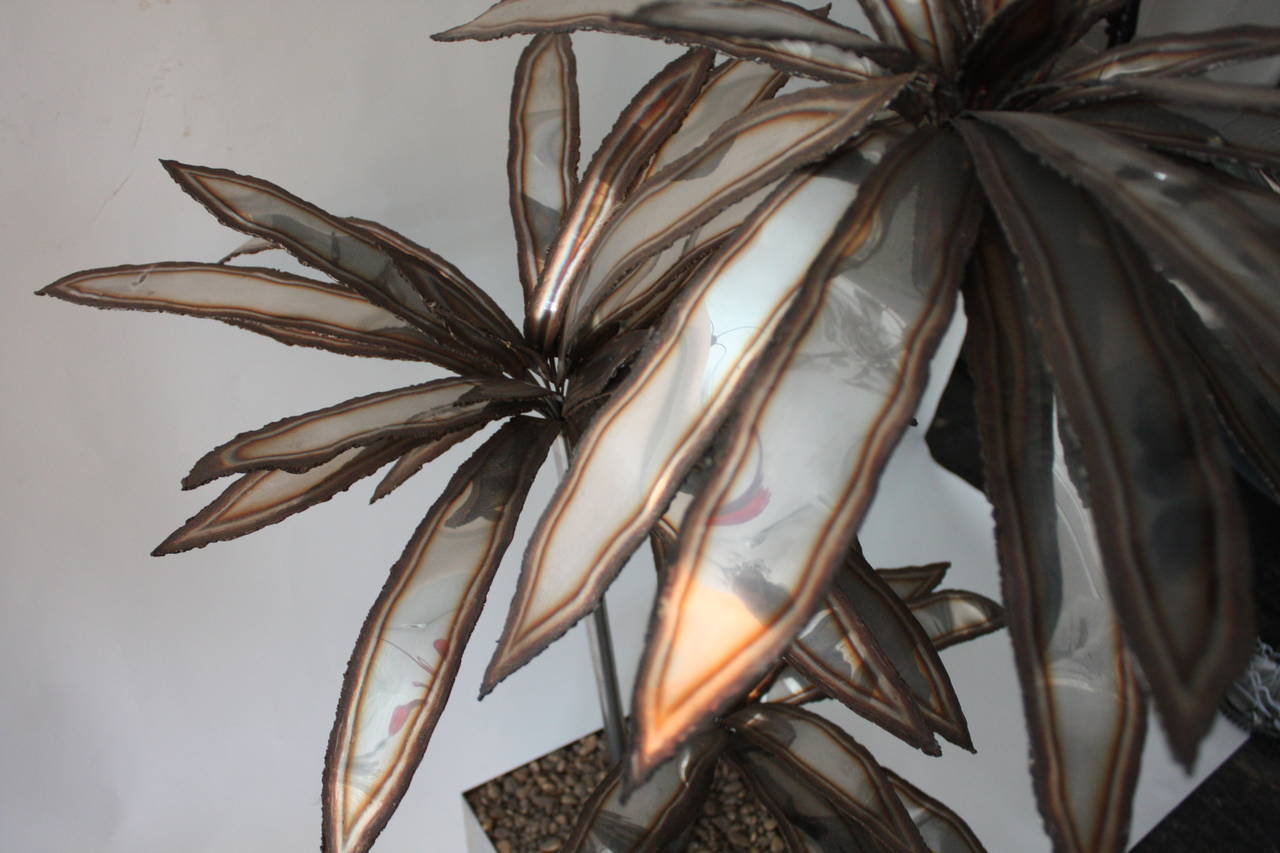 A pair of potted palm trees in steel, can be converted into lamps, 1970s, Italian.