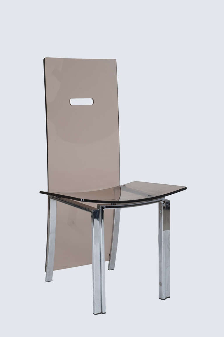 Eight Tinted Plexiglas Chairs