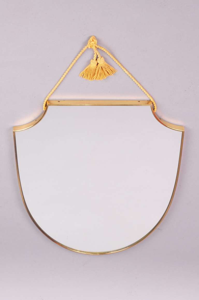 neo classic brass wall mirror with very nice yellow cordon