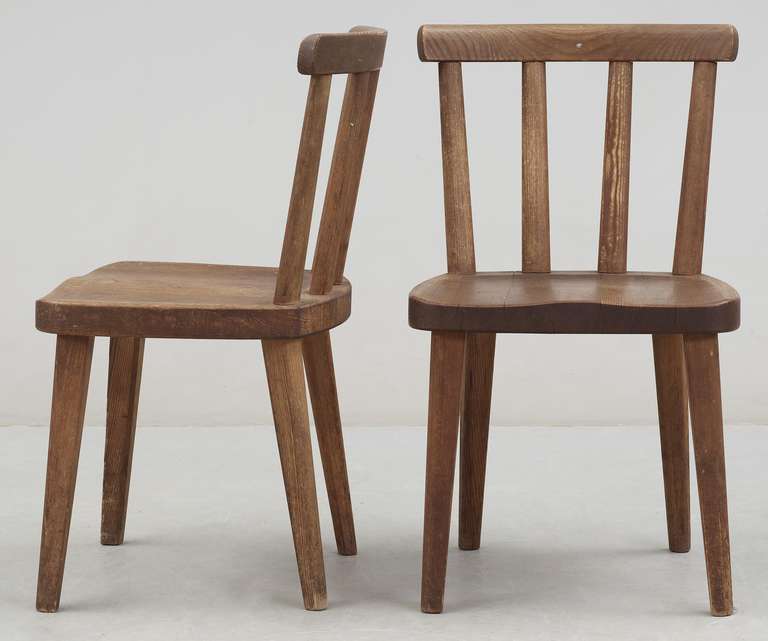 A pair of nordic pine stools by Axel Einar Hjorth. From the 