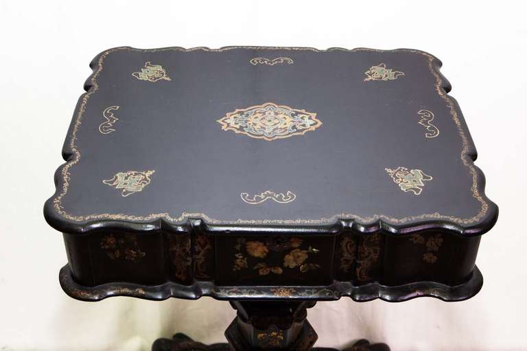 Papier machè table with mother of perl inlays with opening top, 1850 circa.