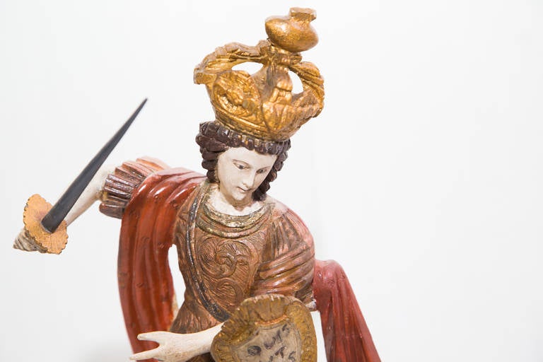 Beautiful detailed, painted solid alabaster representing Archangel Michelangelo. Circa 1790.