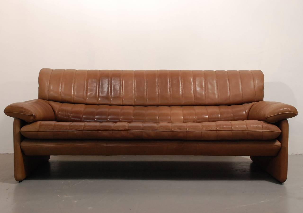 Beautiful DS85 by De Sede from Switzerland. This couch has a very nice patina and the cushions are comfortable but firm. The very thing bull-leather feels soft and stretchy. The price includes delivery to any place in the US.