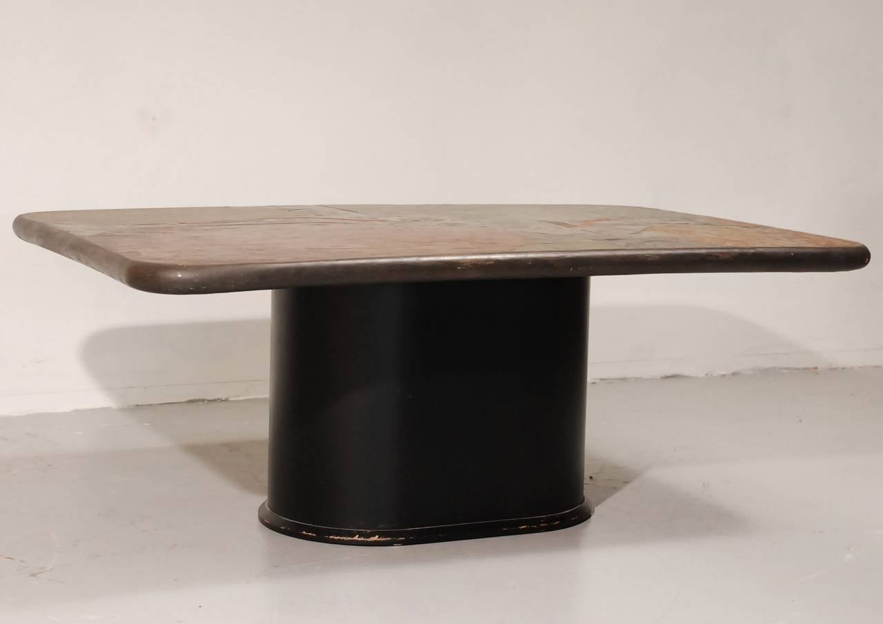 Rare coffee table from the designer and producer C, Kneip. made of very heavy slate. Very similar to the Kingma tables, with the same details: brass and copper elements. There are also two sidetables available. The price includes delivery to the US.