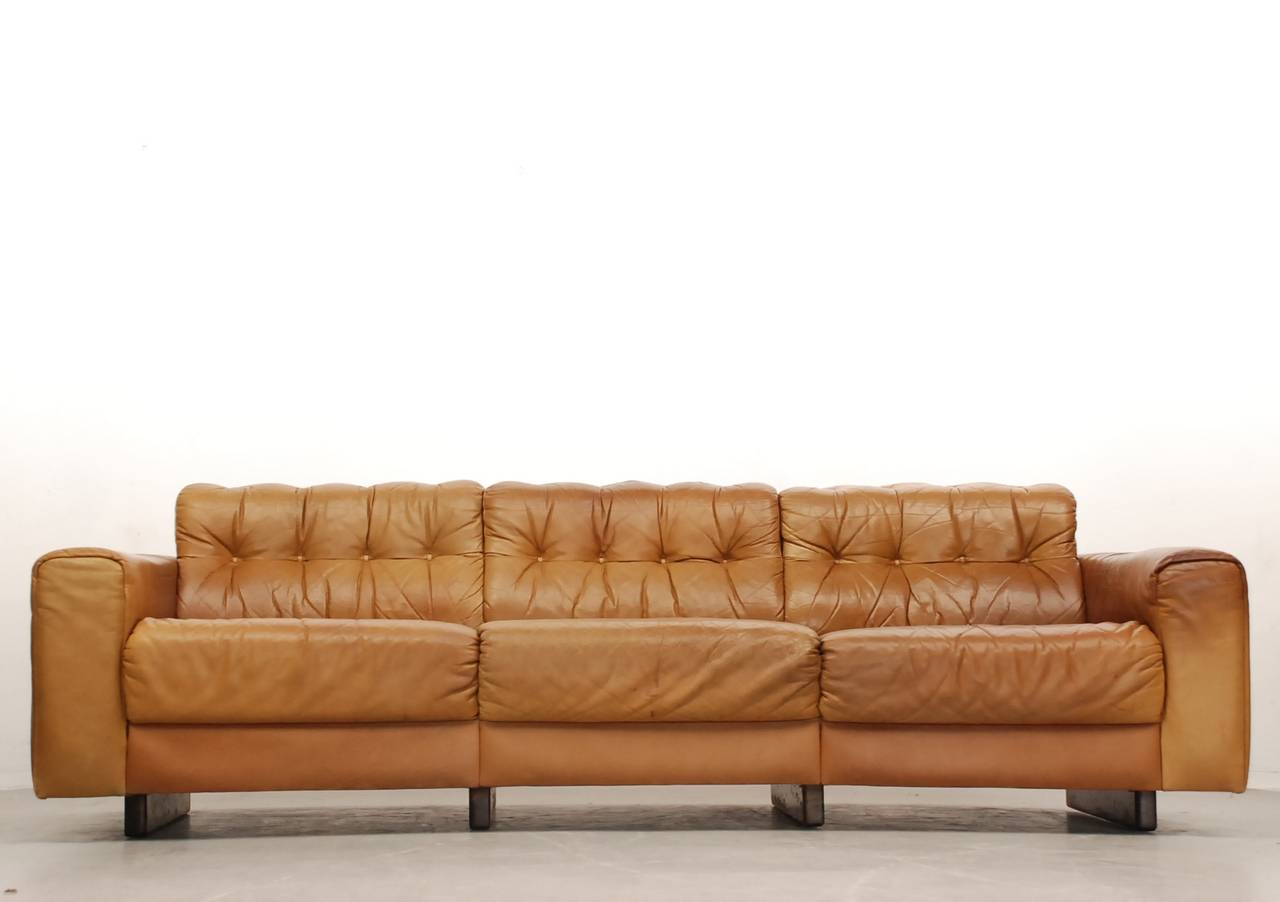 Very rare DS40 three-seater in soft leather from the famous Swiss brand De Sede. These is also a two-seater and a club chair available. We have treated this sofa with transparent aniline to preserve its character, but to protect again for many years