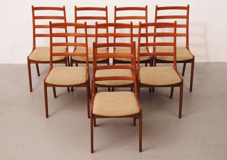 Beautiful ladder back chairs from Kai Kristiansen in teak.  They still have the original upholstery, which is as new. Chairs and upholstery are cleaned professionally.