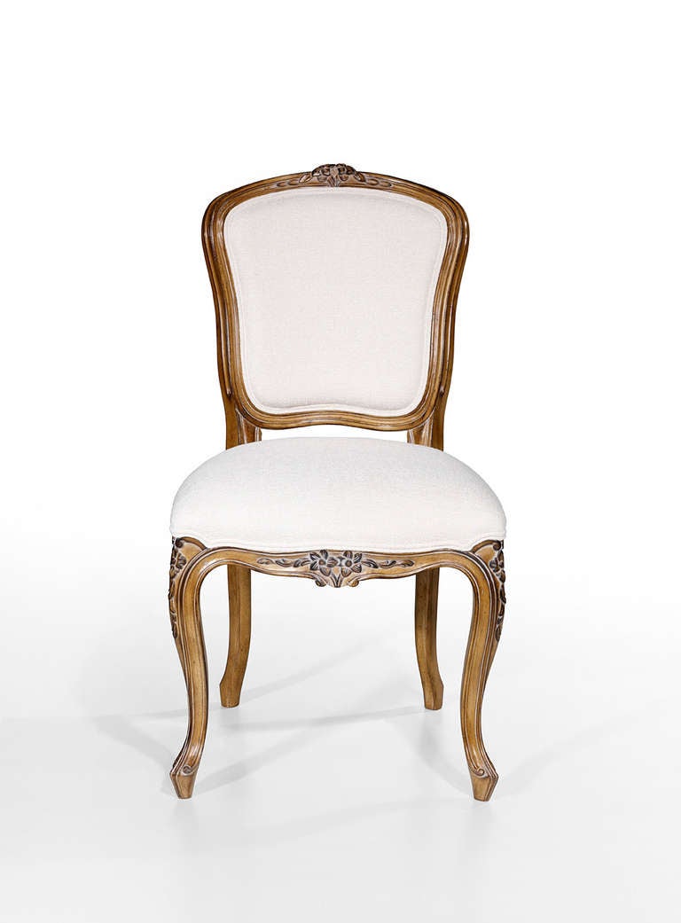 The Maine dining chair is shown in Cherry wood with an Avignon finish. Note the Louis XV cabriolet legs and the bow en arbalète back.