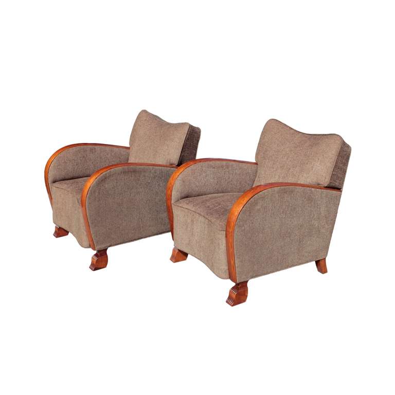 Definitive and well proportioned pair of Swedish bergeres with bent armrests, in-curved seat apron and backrest top rail. Front pair of reeded feet, short splayed back legs. Armrests in elm, legs in birch.  Covered with fine chenille fabric.