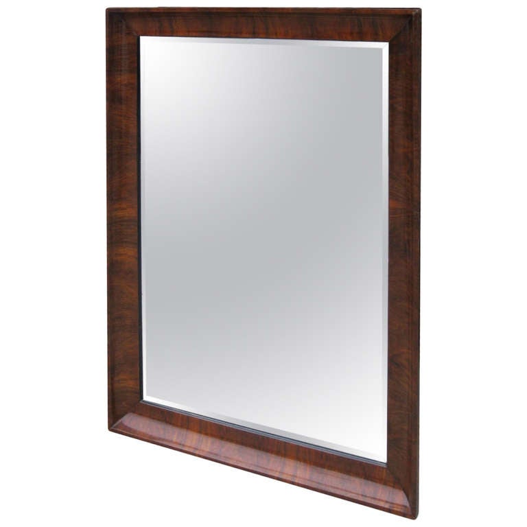 Rectangular recessed mirror frame in walnut with beveled mirror plate. Could be hung horizontally as well.