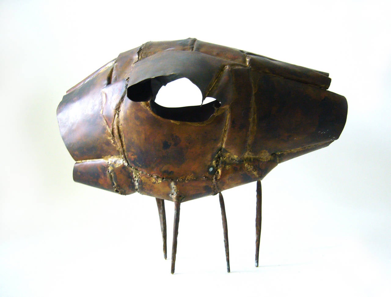 A handmade, patchwork metal sculpture created by Richard Takao Okuda of Altadena, California. Reminiscent of Lee Bontecou's structural sculptures and paintings. Sculpture measures: 12.5